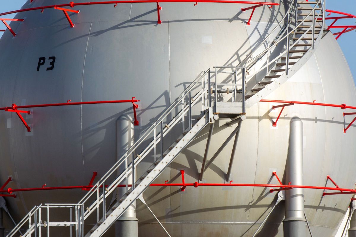 Spherical pressure vessel with a stair, platform and handrail brackets welded to the shell